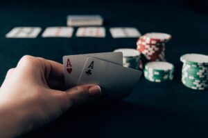 stock photo woman holding playing cards casino